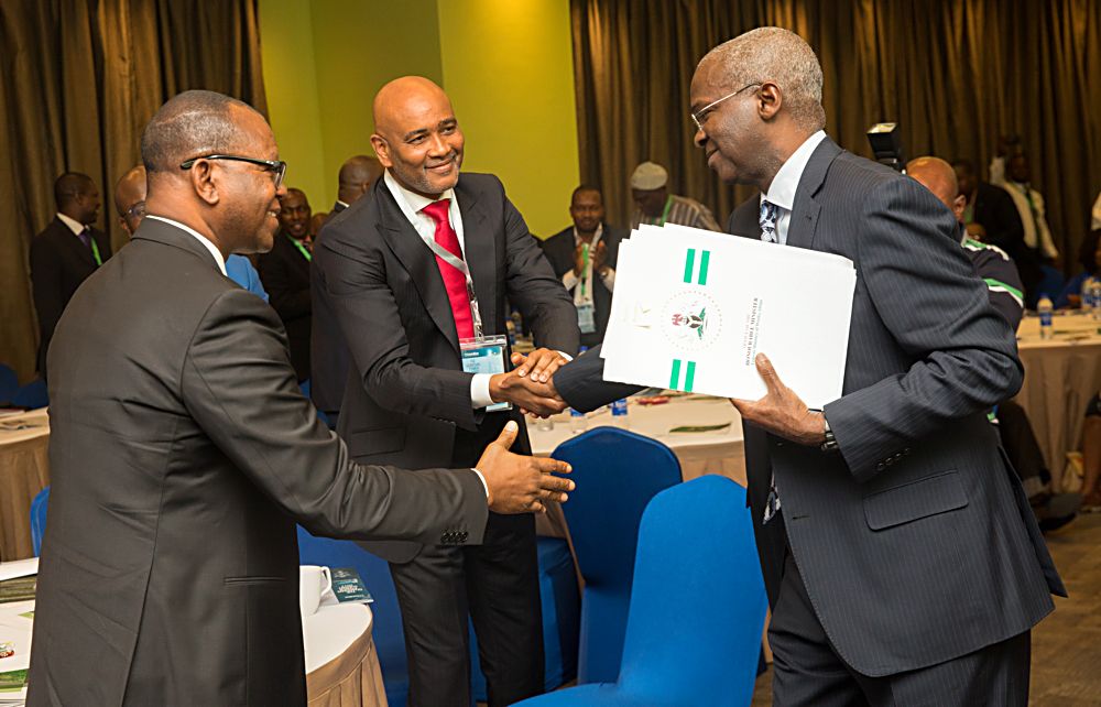 Hon Minister of Power Works  HousingMr Babatunde FasholaSANright  Lead Partner Detail Commercial Solicitors Mr Ayuli Jemide and another participant duringThe Guardian Power Summit 2017 with the theme Beyond Rhetoric Turning Nigerias Power Sector Value  Chain Potentials to Profitat the Four Points By Sheraton Victoria Island Lagos on Monday 14th September 2017