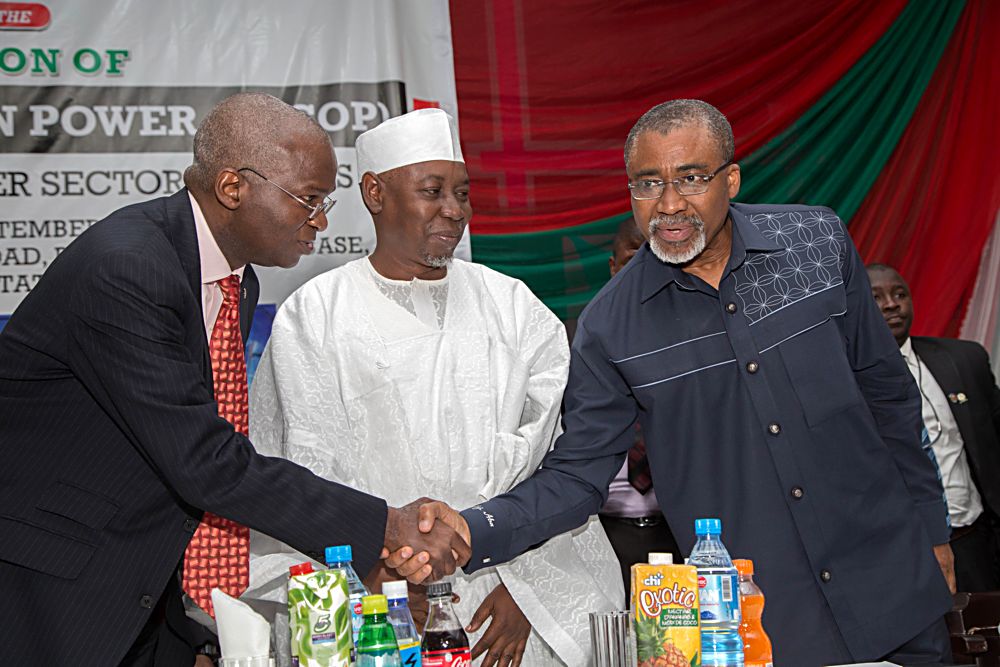 Hon Minister of Power Works  Housing Mr Babatunde Fashola SANleft Minister of State Surv Suleiman Zarma Hassan middle and Chairman Senate Committee on Power Senator Eyinnaya Abariberight during the Executive Session of the 3rd National Council on PowerNACOP with the theme Completing Power Sector Reforms at the Crest Hotel  Gardens Old Airport Road Jos Plateau State on Thursday 21st September 2017