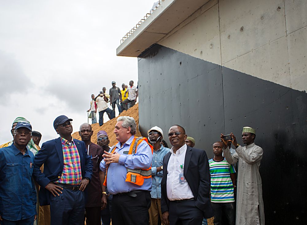 Hon Minister of Power Works  Housing Mr Babatunde Fashola SAN 2nd left Minister of Agriculture and Rural Development Chief Audu Ogbeh left Chief Engineer Reynolds Construction Nigeria Limited Mr Igor Zauodtchik 2nd right and Director Highways Bridges and Design Engr Sylvester Jijingi rightduring a joint inspection by the Ministers of the ongoing construction of Loko Oweto Bridge over River Benue in Nasarawa and Benue States on Tuesday 26thSeptember 2017