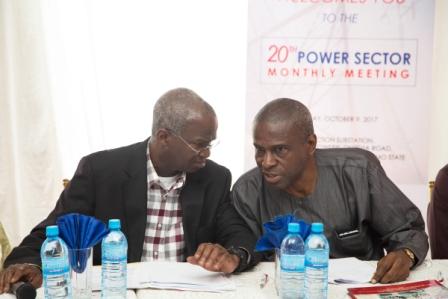 Hon Minister of Power Works  Housing Mr Babatunde Fashola SAN left and Permanent Secretary Power Engr Louis Edozien right during the 20th Monthly Meeting with Sectoral Participants in the Power Sector hosted by Enugu Electricity Distribution CompanyEEDC at the ZO5 Injection Substation along Owerri  Onitsha Road Owerri Imo State on Monday 9th October 2017