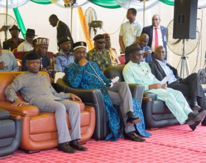 Vice President Prof YemiOsinbajo SAN right Minister of Power Works  Housing Mr Babatunde Fashola SANright and His Majesty King Edward Asimini William Dappa Pepple Perekule XI Amayanabo of Grand Bonny Kingdom2nd left during the Flag Off Ceremony for Construction of Bonny  Bodo Road Rivers State on Thursday 12 October 2017