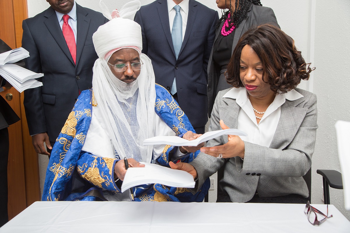 Managing Director Nigerian Bulk Electricity Trading Plc NBET Dr Marilyn Amobi right and Emir of Kano Emir Muhammad Sanusi II  left during the signing of the Qua Ibo Power Plants Power Purchase Agreement with NBET at the Ministry of Power Works  Housing Headquarters  Mabushi Abuja 