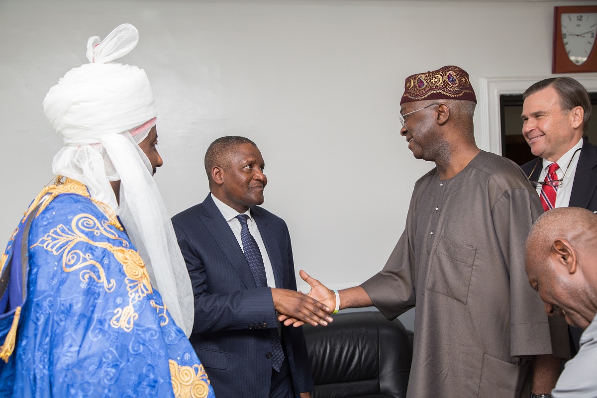  Hon Minister of Power Works  Housing Mr Babatunde FasholaSAN 2nd right Emir of Kano Emir Muhammad Sanusi II left Chairman Dangote Group Alhaji Aliko Dangote 2nd left and US Ambassador to Nigeria Mr Stuart Symingtonright shortly before the signing of the Qua Ibo Power Plants Power Purchase Agreement with NBET at the Ministry of Power Works  Housing Headquarters  Mabushi Abuja 