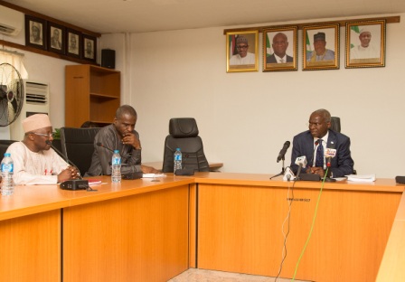 Hon Minister of Power Works  Housing Mr Babatunde Fashola SANright Permanent Secretary Power Engr Louis Edozienmiddle and Vice Chairman Nigerian Electricity Regulatory Commission Mr Sanusi Garba2nd left during the presentation of the Eligible Customers Regulations 2017to the Hon Minister at the Ministry of Power Works  Housing Headquarters Mabushi Abuja on Monday 6th November 2017