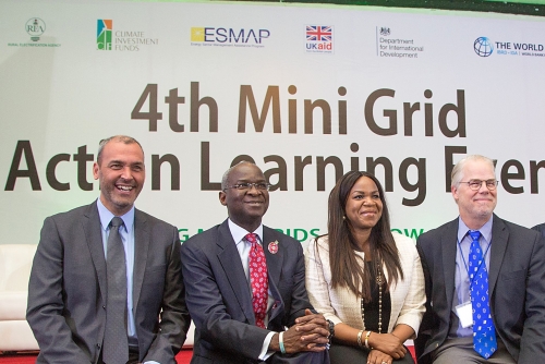 Hon Minister of Power Works  Housing Mr Babatunde Fashola SAN2nd leftManaging Director Rural Electrification Agency Mrs Damilola Ogunbiyi2nd right Task Team LeaderNigeria Rural Electrification Project World Bank Mr Jon Exelleft and Representative of Nigeria Country Director World BankMr Mac CosgroveDaviesright in a group photographshortly after the Opening of the Nigeria Mini Grid Roundtable at the 4th Mini Grid Action Learning Event with the theme Upscaling Mini Grids for Low  Cost  Timely Access to Electricty at the Sheraton Hotel Ladi Kwali Hall Abuja on Tuesday 5th December 2017