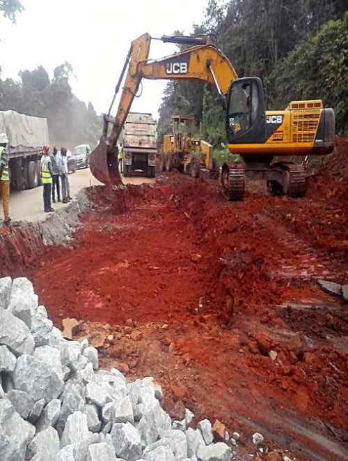 Personnel of the Reynolds Construction Company Nigeria Limited undertaking various construction activities including earthworks stone base Asphalt binder course Asphalt wearing course sideline drains median line drains kerb stones Bridges and Culverts for erosion control among othersat the dualization of Lokoja Benin RoadObajana Junction  Benin Section IV Phase I Ehor  Benin City Edo Stateas captured in the monthly progress report directed during the recent meeting of the HonMinister of PowerWorks and Housing Mr Babatunde Fashola SAN with contractors handling major projects across the country