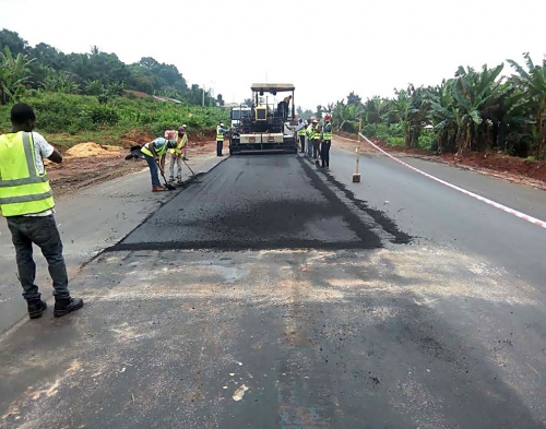 Personnel of the Reynolds Construction Company Nigeria Limited undertaking various construction activities including earthworks stone base Asphalt binder course Asphalt wearing course sideline drains median line drains kerb stones Bridges and Culverts for erosion control among othersat the dualization of Lokoja Benin RoadObajana Junction  Benin Section IV Phase I Ehor  Benin City Edo Stateas captured in the monthly progress report directed during the recent meeting of the HonMinister of PowerWorks and Housing Mr Babatunde Fashola SAN with contractors handling major projects across the country