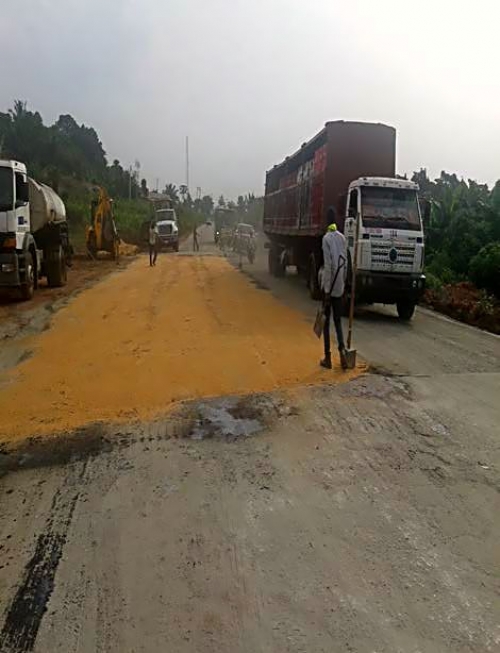 Personnel of the Reynolds Construction Company Nigeria Limited undertaking various construction activities including earthworks stone base Asphalt binder course Asphalt wearing course sideline drains median line drains kerb stones Bridges and Culverts for erosion control among othersat the dualization of Lokoja Benin RoadObajana Junction  Benin Section IV Phase I Ehor  Benin City Edo Stateas captured in the monthly progress report directed during the recent meeting of the HonMinister of PowerWorks and Housing Mr Babatunde Fashola SAN with contractors handling major projects across the country