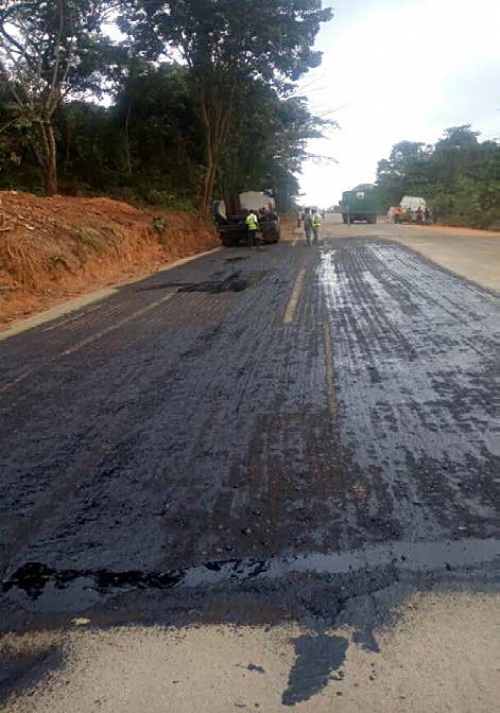 Personnel of the Reynolds Construction Company Nigeria Limited undertaking various construction activities including earthworks stone base Asphalt binder course Asphalt wearing course sideline drains median line drains kerb stones Bridges and Culverts for erosion control among othersat the dualization of Lokoja Benin RoadObajana Junction  Benin Section IV Phase I Ehor  Benin City Edo Stateas captured in the monthly progress report directed during the recent meeting of the HonMinister of PowerWorks and Housing Mr Babatunde Fashola SAN with contractors handling major projects across the country