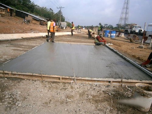 Personnel of the Reynolds Construction Company Nigeria Limitedconstructing the concretelay byeas part of the Reconstruction and Asphalt overlay of Benin OfosuOreAjebaneleShagamu Dual Carriageway Phase IV Ajebandele Shagamuas captured in the monthly progress report directed during the recent meeting of the HonMinister of PowerWorks and Housing Mr Babatunde Fashola SAN with contractors handling major projects across the country