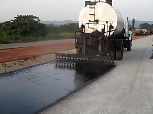 Progress ReportPersonnel of the Reynolds Construction Company Nigeria Limitedlaying the prime coat at the ongoing Rehabilitation of Outstanding Section of Onitsha Enugu Expresswayas captured in the monthly progress report directed during the recent meeting of the HonMinister of PowerWorks and Housing Mr Babatunde Fashola SAN with contractors handling major projects across the country