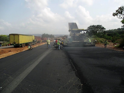 Progress ReportPersonnel of the Reynolds Construction Company Nigeria Limitedlaying Asphalt at the ongoing Rehabilitation of Outstanding Section of Onitsha Enugu Expressway as captured in the monthly progress report directed during the recent meeting of the HonMinister of PowerWorks and Housing Mr Babatunde Fashola SAN with contractors handling major projects across the country