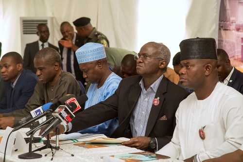 Hon Minister of PowerWorks  Housing Mr Babatunde FasholaSAN2nd right Minister of State SurvSuleiman Zarma Hassan2nd left Permanent Secretary Power Louis Edozeinleft and Governor of Kogi State Mr Yahya Bellorightduring the 22ndMonthly Meeting with Power Sector Operatorshosted bytheKogi State Government and Geregu Power Plc at the Geregu Power 1 Plc ItobeAjaokuta Expressway Ajaokuta  Kogi Stateon Monday  11th December 2017