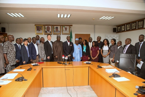 Hon Minister of Power Works  Housing Mr Babatunde FasholaSANmiddle Ministers of State HonMustapha Baba Shehuri8th left and Surv Suleiman Zarma Hassan10th right Permanent Secretary Power Engr Louis Edozien6th lightManaging Director Nigerian Bulk Electricity Trading PlcNBET Dr Marilyn Amobi9th right Chief Executive Officer Kingline Development Nigeria Limited Mr Sean Kim7th leftManaging Director KLDNL Mr Akinnola Fola6th left and others in a group photograph shortly after the Execution of the Power Purchase Agreement for a 550MW Gasfired Power Project in Ondo State between NBET and Kingline Development Nigeria Limited at  the Ministry of Power Works  Housing Headquarters Mabushi Abuja on Thursday 14th December 2017