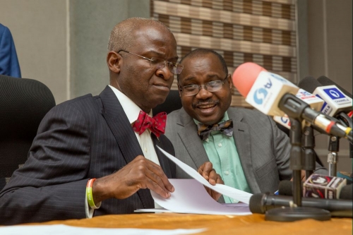 Hon Minister of Power Works  Housing Mr Babatunde FasholaSANleft and Interim Managing DirectorCEO Transmission Company of NigeriaTCNMr Usman Gur Mohammedright during the Submission of Report on Consultancy Service on 20Year Transmission Expansion Plan Development of Power System Master Plan for TCN  to the Minister at the Auditorium of the Ministry of PowerWorks  Housing Headquarters Power House Maitama AbujaFCT on Tuesday 30th January 2018