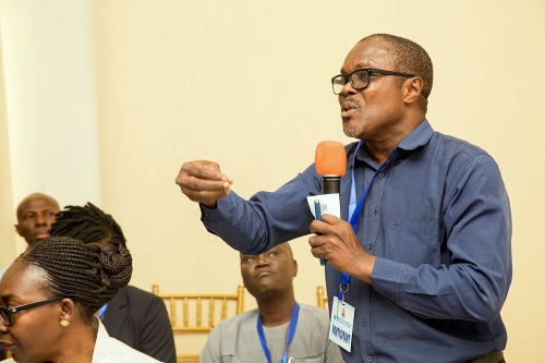 A participant Engr Idowu Desmennuduring the Question  Answer shortly after the Keynote Address of theHon Minister of Power Works  Housing Mr Babatunde FasholaSAN atthe 1st Stakeholders Workshop on Off  Taking 2000MW Unutilized Power for Eligible Customers organized by the Ministry of Power Works and Housing at the Setraco Cedar Estate Gwarimpa II Abuja on Tuesday 13th February 2018