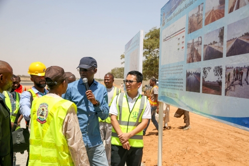 Hon Minister of Power Works  Housing Mr Babatunde FasholaSAN middleFederal Controller of Works Kano State EngrUmbraDangeleft andCCECC Nigeria LimitedProject Manager EngrShen Huijunright  during the Hon Ministers inspection of the ongoingdualization of Kano  Katsina Road Phase 1 Kano Town at Dawanau Roundabout to Katsina State Border in Kano Statebeing part of Highway Projects in the North West Zone on Sunday 11th March 2018