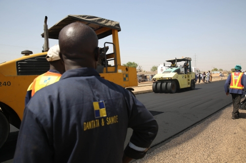 Personnel ofDanatata  Sawoe Nigeria Limited workingduring an inspection tourof the ongoing dualization of Kano Western by Pass in Kano State being part of Highway Projects in the North West Zoneby theHon Minister of Power Works  Housing Mr Babatunde Fashola SAN on Sunday 11th March 2018