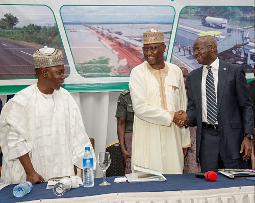 Hon Minister of Power Works  Housing Mr Babatunde Fashola SANright Representative of the President  Secretary to the Federal Government Mr Boss Mustaphamiddle and Minister of State Surv Suleiman Hassanleftduring the Opening Session of the One  Day Public Enlightenment on Developmentsin the Road Sectororganized by the Ministry of Power Works and Housingat the Nigeria Air Force Conference Centre Abuja on Monday 19th March 2018