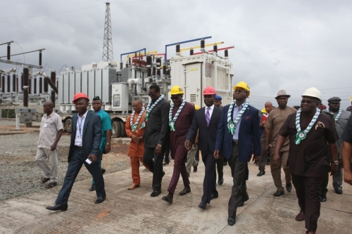 Hon Minister of Power Works  Housing Mr Babatunde FasholaSAN2nd rightGovernor of Abia State Dr Okezie Ikpeazurightand othersduring the commissioning of 40MVA 13233kv Mobile Power Transformer shortly before the 26th Meeting with Operators in the Power Sector hosted by the Transmission Company of NigeriaTCN at the Ohiya Transmission Substation Umuahia Abia State on Monday 9th April 2018