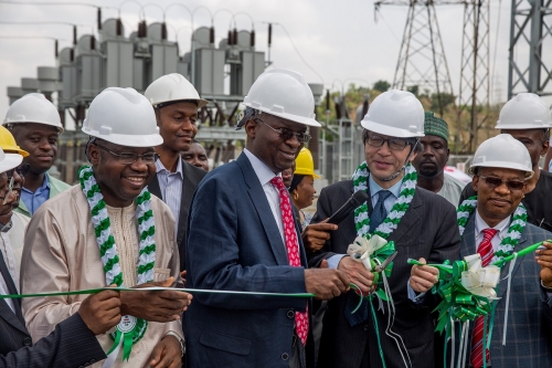 Hon Minister of Power Works  Housing Mr Babatunde Fashola SAN middle Managing DirectorCEO Transmission Company of NigeriaTCN MrUsman Gur Mohammedleft and Special Guest of Honour Japanese Ambassador to Nigeria Mr Sadanobu Kusaokerightduring the commissioning of 60MVAR Capacitor Bank funded by Japanese International Cooperation Agency JICA at Apo 13233kV Transmission Substation Apo Abuja on Thursday 12 April 2018