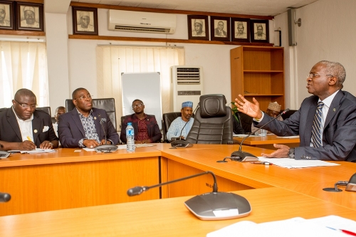 Hon Minister of Power Works  Housing Mr Babatunde FasholaSANrightPresident  Association of Indigenous Construction Contractors of Nigeria Otunba Oluwaranti Lekan Osifesomiddle and Secretary to theAssociation  Otunba Muyiwa Ibeun left duringthe Hon Ministers meeting with theAssociation of Indigenous Construction Contractors of Nigeria AICCONat the Ministry of PowerWorks  Housing HeadquartersMabushiAbuja on Monday 23rd April 2018