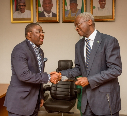 Hon Minister of Power Works  Housing Mr Babatunde FasholaSANright andPresident  Association of Indigenous Construction Contractors of Nigeria Otunba Oluwaranti Lekan Osifesoleft duringthe Hon Ministers meeting with theAssociation of Indigenous Construction Contractors of NigeriaAICCONat the Ministry of PowerWorks  Housing Headquarters MabushiAbuja on Monday 23rd April 2018