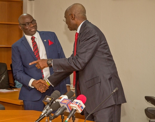 Hon Minister of Power Works  Housing Mr Babatunde Fashola SANright and ChairmanNigerian Electricity Regulatory CommissionNERC Prof James Momohleft shortly afterhis inauguration by the HonMinister at the Ministry of Power Works  HousingHeadquarters Mabushi Abuja on Thursday 3rd May 2018