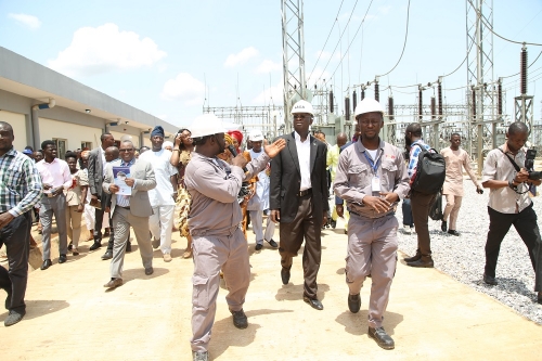 Hon Minister of Power Works  Housing Mr Babatunde Fashola SAN middleand othersbeing conducted round by theManager System Operation in LagosEngr Folorunsho David left shortly after the commissioning of the New 2X60MVA 13233KVOdogunyanTransmission SubstationIkorodu Lagos State on Monday 7thMay 2018