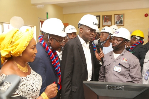 Hon Minister of Power Works  Housing Mr Babatunde Fashola SAN 2ndright Managing DirectorCEO Transmission Company of NigeriaTCN Mr Usman Gur Mohammed2ndleftManaging DirectorCEO LAGA CE Power Ltd Mrs Rhoda Afolabi and theManager System Operation in LagosEngr Folorunsho David during the inspection of the Control Room shortly after the commissioning of the New 2X60MVA 13233KVOdogunyanTransmission SubstationIkorodu Lagos State on Monday 7thMay 2018