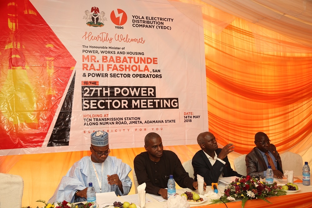 Hon Minister of Power Works  Housing Mr Babatunde FasholaSAN 2nd rightPermanent Secretarty Power Engr Louis Edozien2nd left Commissioner Finance and Management Services Nigerian Electricity Regulatory Commission NERCMr Nathan Rogers Shatti  left andManaging DirectorYola Electricity Distribution CompanyYEDCEngr Baba Umara Mustapharightduri ng the 27th Meeting with Operators in the Power Sector hosted by the Yola Electricity Distribution Company YEDC at the TCN Transmission Station along Numan Road Jimeta  Adamawa State on Monday 14th May 2018