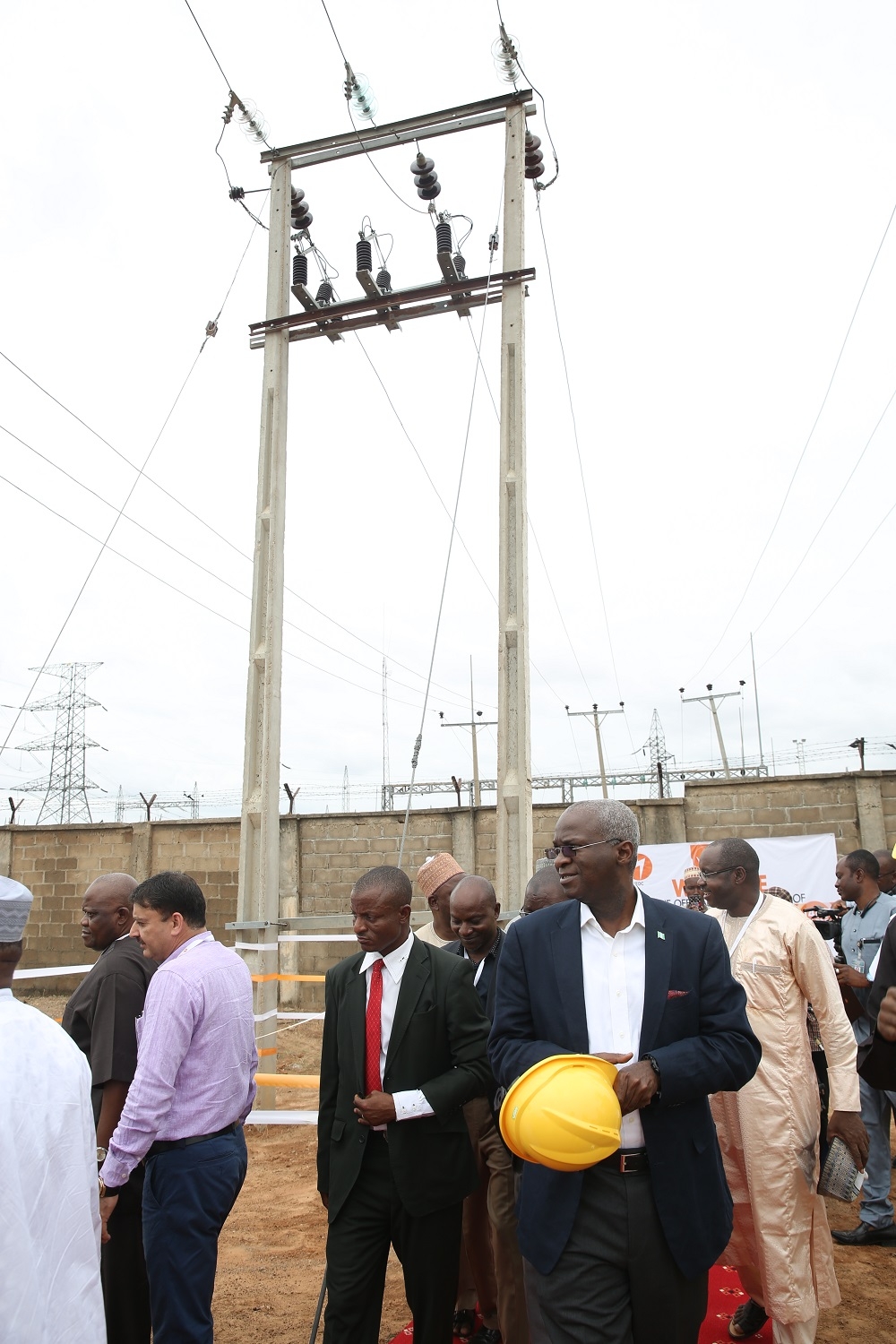 Hon Minister of Power Works  Housing Mr Babatunde FasholaSANrightand othersduring the commissioning of the 33KV Industrial Feeder to Kofare Industrial Area Jimeta shortly before the 27th Meeting with Operators in the Power Sector hosted by the Yola Electricity Distribution CompanyYEDC at the TCN Transmission Station along Numan Road Jimeta Adamawa State on Monday 14th May 2018