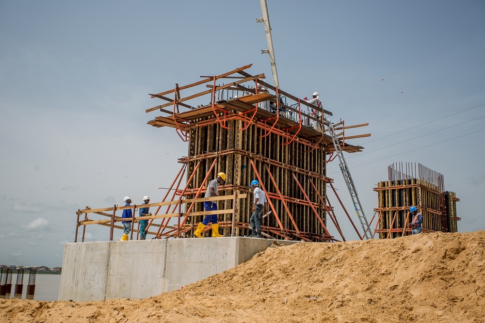 Personnel of Julius Berger Nigeria Plc at work during theinspection tour of the ongoing construction work on 2nd Niger Bridge in Anambra and Delta States by theHon Minister of Power Works  Housing Mr Babatunde FasholaSANon Day Three of his inspection tour of Federal Government Infrastructure Projects in the South East Zone of the country on Thursday 19th May 2018