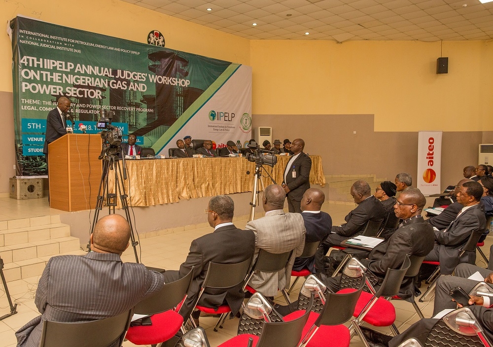 Hon Minister of Power Works  Housing Mr Babatunde Fashola SANleft presenting his Goodwill Message duringthe Opening Ceremony of the 4thIIPEPNJI Annual Judges Workshop on Petroleum Gas and Power Sectors with the theme The Judiciary and Power Sector Recovery Programme  Legal Commercial and Regulatory Issues at the Aloysisus Katsina Alu Seminar Hall National Judicial Institute on Tuesday 5th June 2018