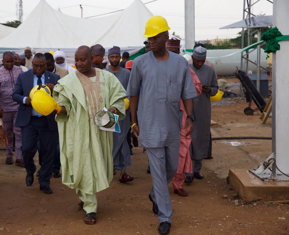 Hon Minister of Power Works  Housing Mr Babatunde FasholaSANright andrepresentative of the Governor of Kaduna State  Permanent Secretary of the Ministry of Rural and Community Development Mallam Mahmud Zailanileft duringthe commissioning of the 60MVA 13233KV Transformer at the Zaria Transmission Substation Zaria Kaduna State on Sunday 10th June 2018