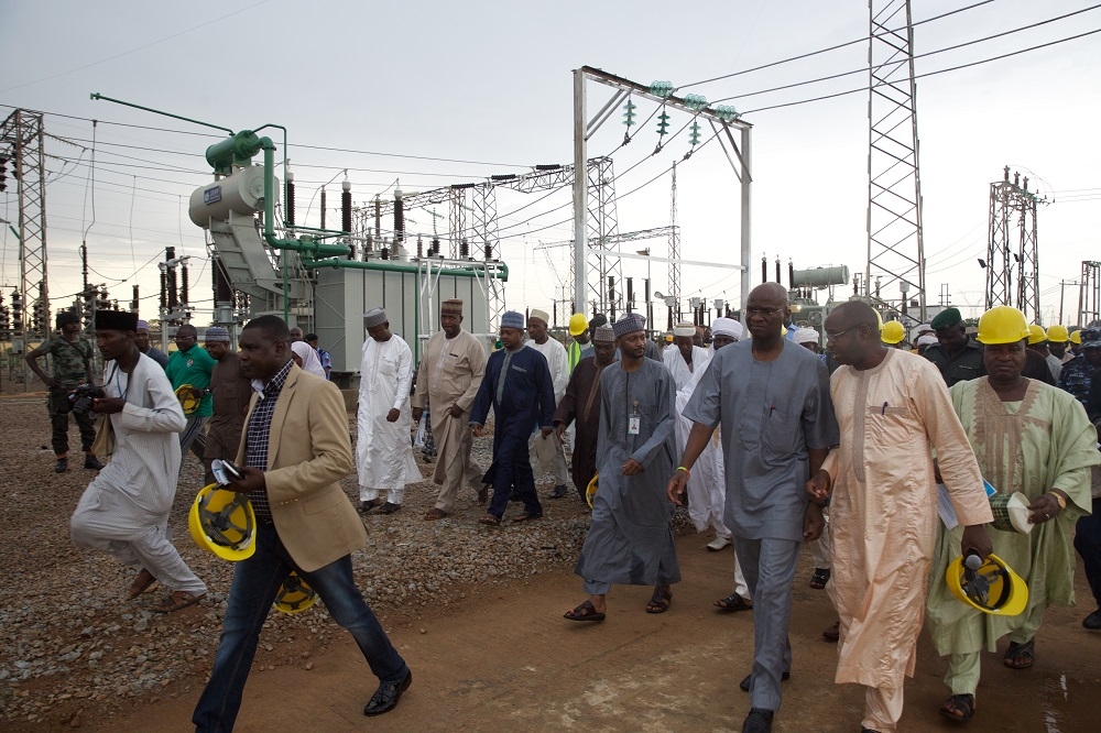 Hon Minister of Power Works  Housing Mr Babatunde FasholaSAN2nd right  Managing Director CEO Transmission Company of Nigeria Mr Usman Gur Mohammedmiddle and representative of the Governor of Kaduna State  Permanent Secretary of the Ministry of Rural and Community Development Mallam Mahmud Zailani rightshortly after the commissioning of the 60MVA 13233KV Transformer at the Zaria Transmission Substation Zaria Kaduna State on Sunday 10th June 2018