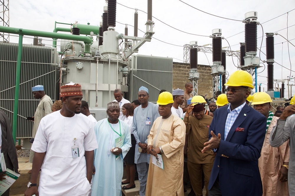 Hon Minister of Power Works  Housing Mr Babatunde FasholaSANrightand others during the commissioning of the 150MVA 33013233kv Transformer at the Mando Transmission Station Kaduna State on Monday 11th June 2018