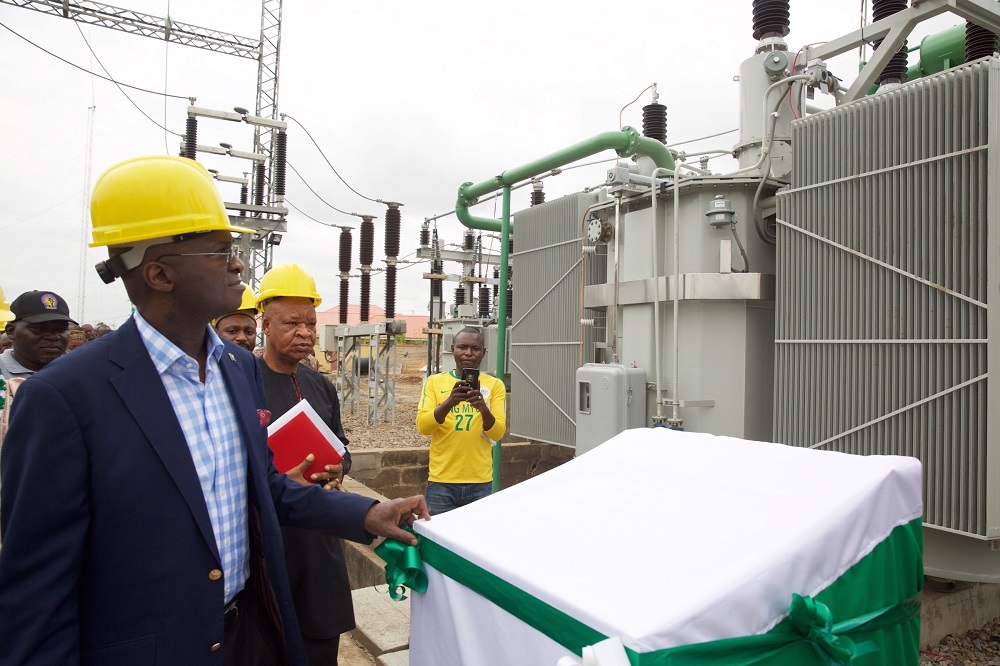 Hon Minister of Power Works  Housing Mr Babatunde FasholaSANleftduring the commissioning of the 150MVA 33013233kv Transformer at the Mando Transmission Station Kaduna State on Monday 11th June 2018