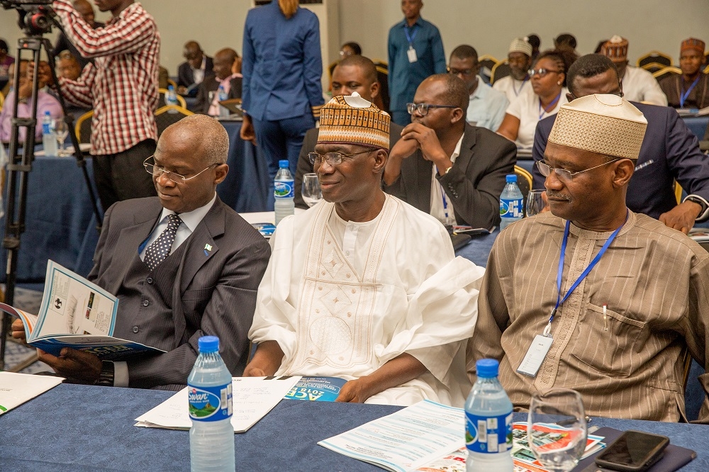 Hon Minister of Power Works  Housing and Guest Speaker Mr Babatunde FasholaSANleft Managing DirectorCEOFederal Roads Maintenance Agency Engr Nurudeen Abdurahaman Rafindadi right and Representative of Minister of Federal Capital Territory Engr Mohammed Bashir Idrismiddleduring the 2018 Extra Ordinary General Meeting with the theme The Role of Engineering Consultants in the Implementation of the Presidential Executive Order 5 organized by theAssociation for Consulting Engineering in Nigeriaat the NAF Conference Centre  SuitesAbuja on Thursday 5th July 2018