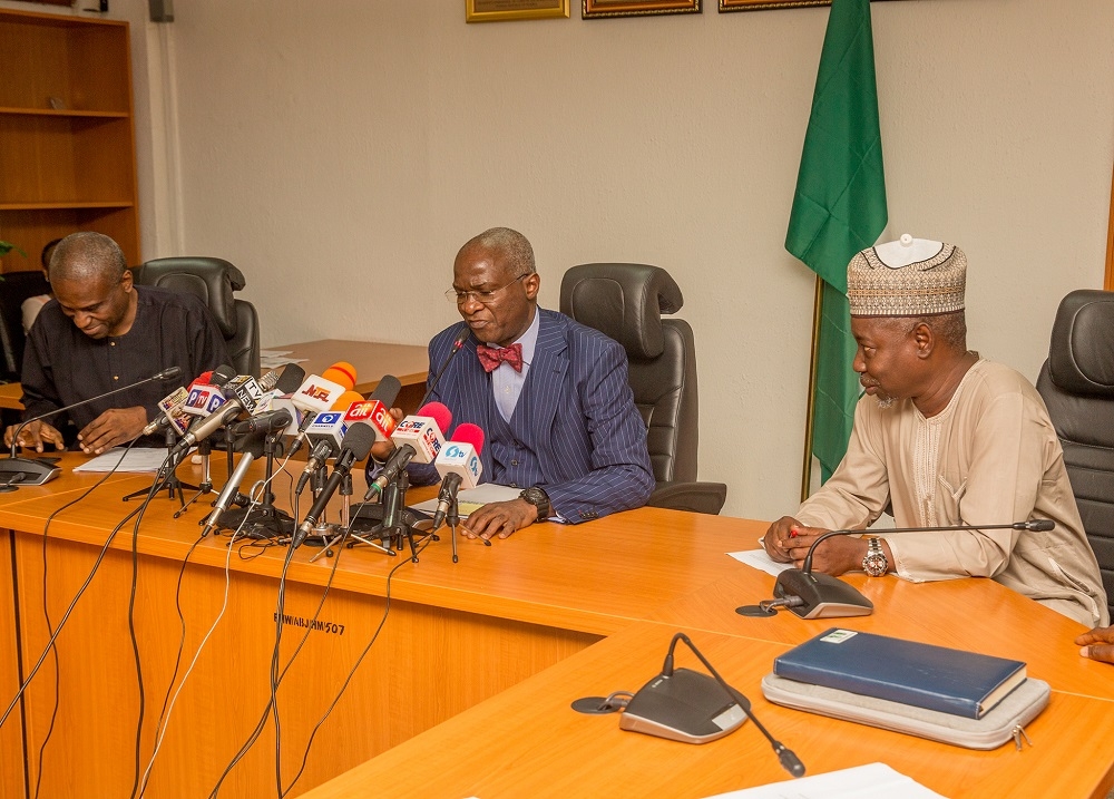 Hon Minister of Power Works  Housing Mr Babatunde FasholaSAN middle Minister of State Surv Suleiman Zarma Hassan right and Permanent Secretary Power Engr Louis Edozien left during the HonMinisters Press Briefing onthe State of Play in the Power Sector Next Stepsand Policy Directions at the Ministry of PowerWorks  Housing Headquarters Mabushi Abuja on Monday 9th July 2018