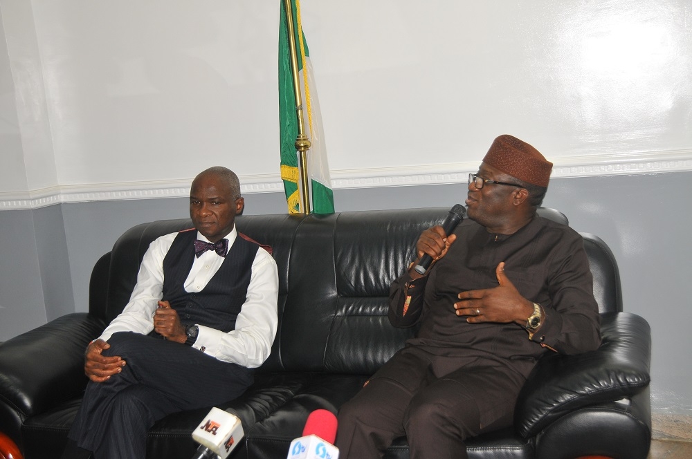 Honourable Minister Mr Babatunde Fashola SAN receives Dr Kayode Fayemi Ekiti State Governor elect at the Ministrys Headquarter Mabushi Abuja 