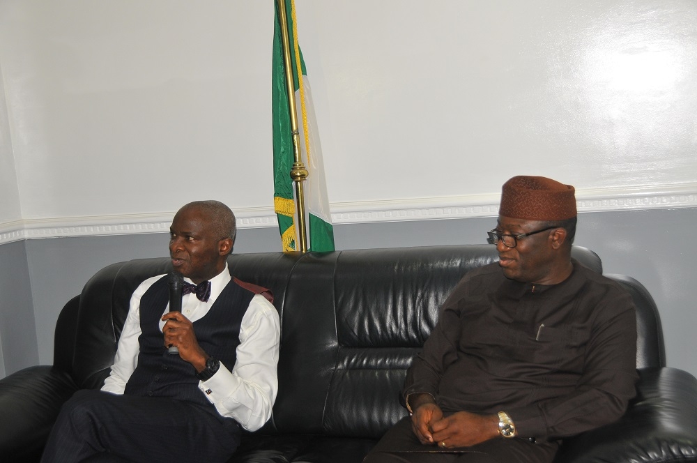 Honourable Minister Mr Babatunde Fashola SAN receives Dr Kayode Fayemi Ekiti State Governor elect at the Ministrys Headquarter Mabushi Abuja 