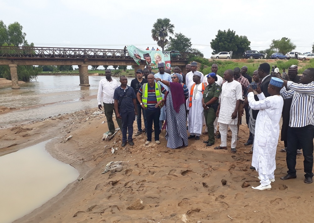 Inspection of damage Kudzum Bridge at Section CH 26  500 Yola  Mubi Road Adamawa State by Senator Binta Masi Garba Engr Yemi Oguntominiyi Director Highway Construction and Rehabilitation Dr Famous Eseduwo Director Planning Research and Statistics Engr MR Muhammad Director HNE Engr Salihu A O Federal Controller Adamawa State and other staff of the Federal Ministry of Power Works and Housing on the 26th of August 2018