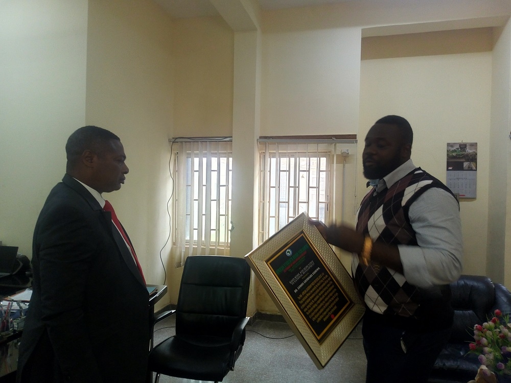 A courtesy call and presentation of Prize for Excellence on the Director Planning Research and Statistics Department Dr Famous S Eseduwo by members of African Students Union Parliament ASUP at the Ministrys Headquarter Mabushi Abuja on the 16th of October 2018