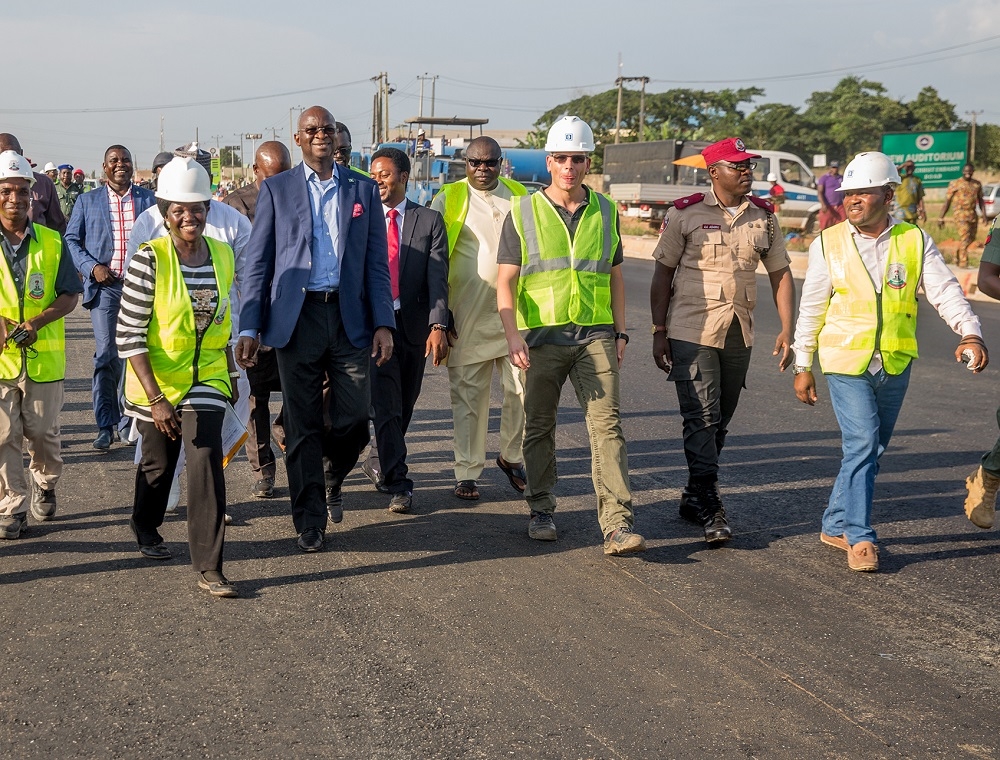 Hon Minister of Power Works  Housing Mr Babatunde Fashola SAN2nd leftFederal Controller of Works Ogun State Engr Joshua Popoola 4th rightbehind a Supervisor in the Ministry  Engr Mrs Olokeogun Abiola left and othersduring the HonMinisters inspection of the ongoing Rehabilitation Reconstruction and Expansion of theLagos Ibadan Expresswayon Thursday 25th October 2018