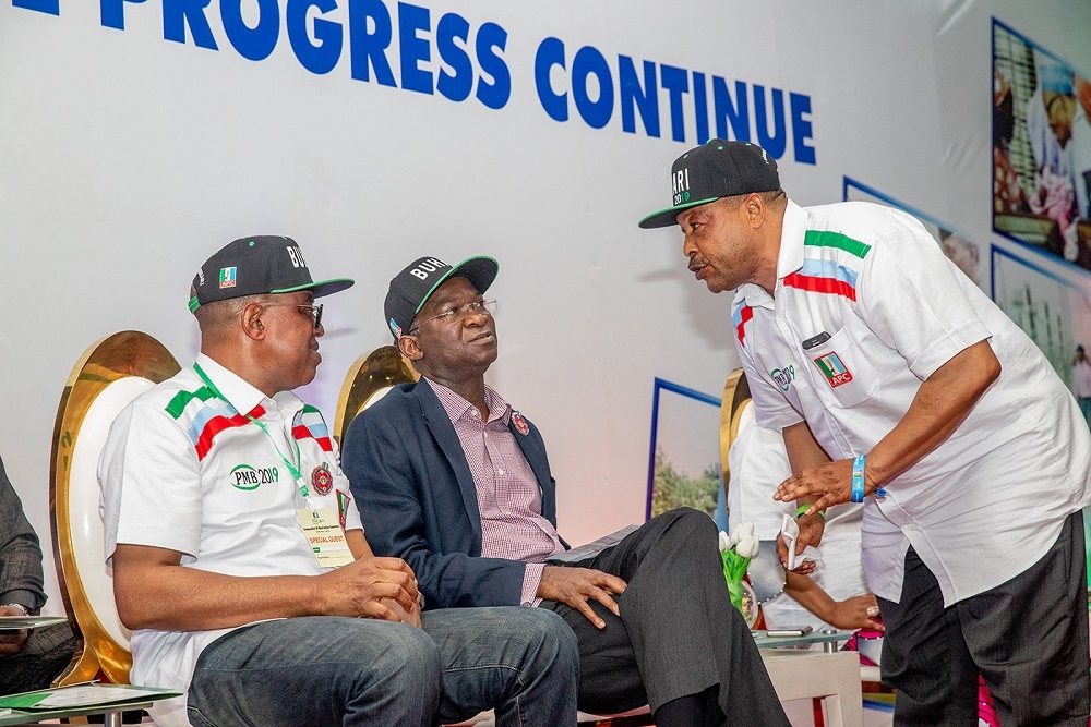 ALL FOR PMB 2019 Hon Minister of Power Works  Housing Mr Babatunde Fashola SANmiddleSenator representing Lagos East District Senator Gbenga Ashafaleft and the Director General PMB 2019 Alhaji Oyinlomo Danmole right during theinauguration ofthe 5000 Foot Soldiers drawn from the 377 Wards in Lagos State to complement the activities of the All Progressives Congress for the reelection of President Muhammadu Buhari and Vice President Prof Yemi Osinbajo SAN at The Haven Event Centre Ikeja Lagos on Tuesday 20th November 2018