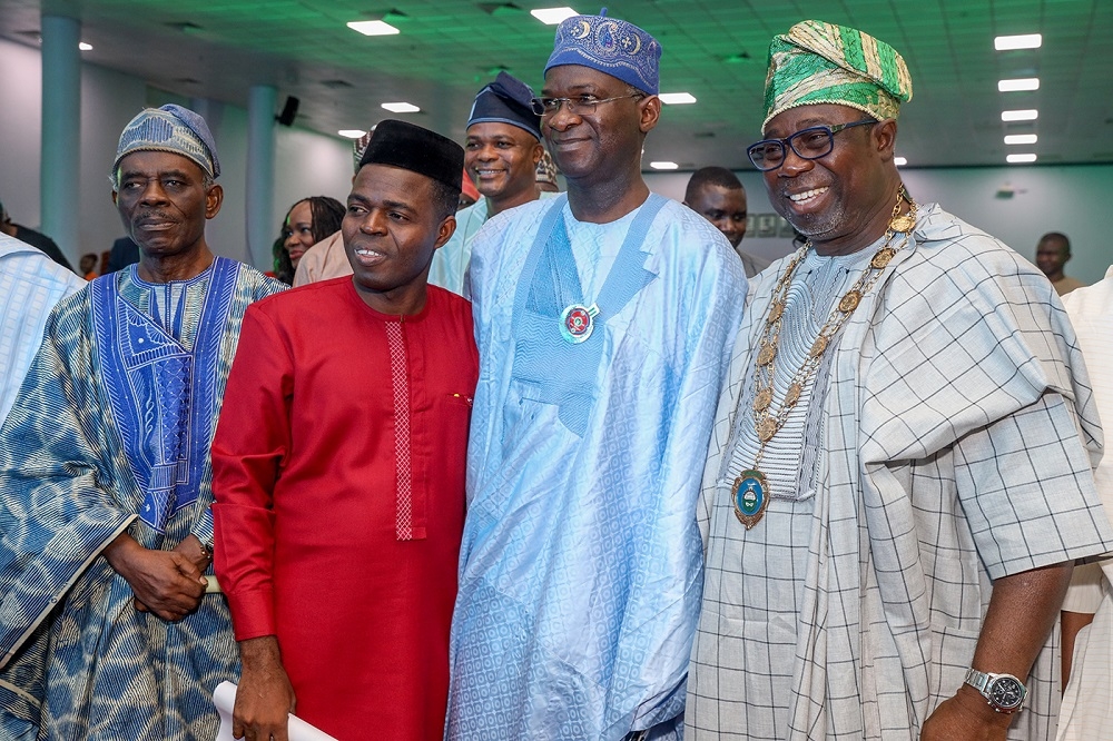 Representative of the President   Hon  Minister of Power  Works   Housing  Mr Babatunde Fashola SAN 2nd right   President of the Nigerian Society of Engineers  Engr  Adekunle Mokuolu right   Past President  Dr  Folasodun Shonubi left  and the Guest Speaker  Engr  Dr  Hilary Owamah  2nd left  during the Nigerian Society of Engineers  60th Anniversary Colloquium with the theme    Re Engineering the Engineers for Optimum National Economic Growth and Development       at the Conference Hall  NAF Conference Centre   Suites on Friday 23rd November 2018