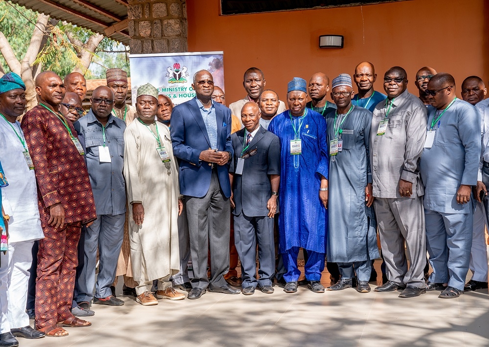 Hon  Minister of Power  Works   Housing  Mr Babatunde Fashola  SAN and the participants in a group photograph shortly after the Opening Ceremony of the Capacity Building Workshop for Federal Controllers of Works in the Ministry of Power  Works   Housing with the theme    Learning and Deveploment for Greater Stature    at the Fifth Chukker Polo Ranch  Jos Road  Kaduna State on Monday 26th  November 2018