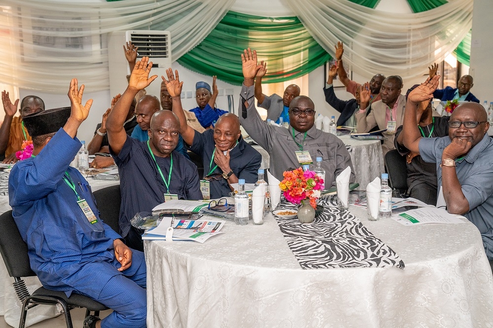 Cross section of Federal Controllers of Works affirming the charge of the Hon  Minister of Power  Works   Housing  Mr Babatunde Fashola SAN that they would take ownership and ensure proper maintenance of the Federal Roads in their respective States during  the Opening Ceremony of the Capacity Building Workshop for Federal Controllers of Works in the Ministry of Power  Works   Housing with the theme    Learning and Deveploment for Greater Stature    at the Fifth Chukker Polo Ranch  Jos Road  Kaduna State on Monday 26th  November 2018