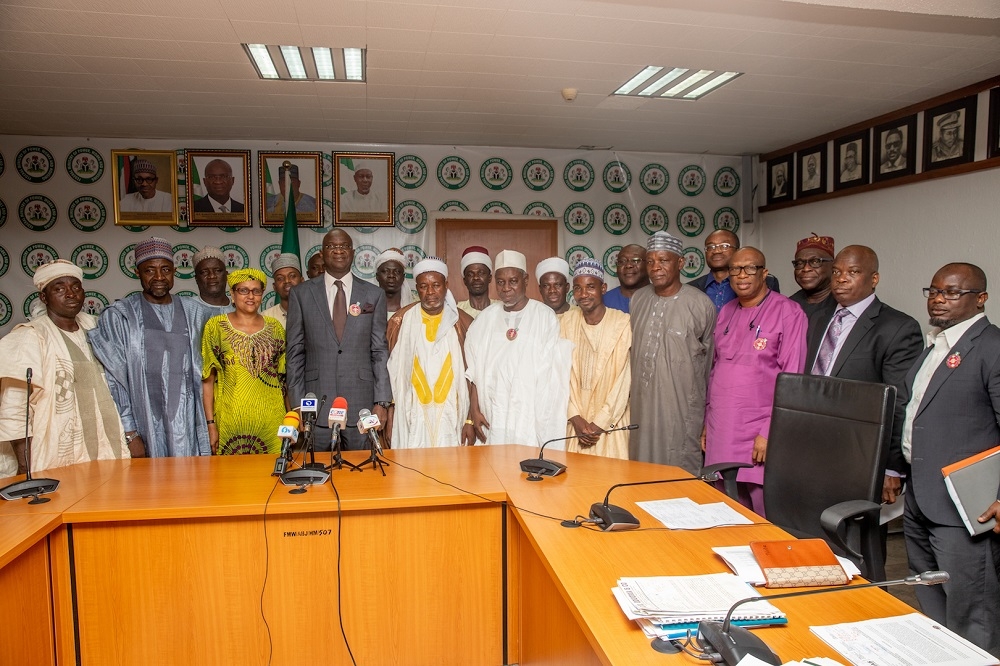 Hon  Minister of Power  Works   Housing  Mr Babatunde Fashola  SAN 4th left   Minister of State  Surveyor Suleiman Zarma Hassan middle   Village Head of Gora  Alhaji  Jafaru Adamu 5th left     Community Elder  Prof  Moh   d Sani Haruna 2nd left   Farming Entrepreneur    Hajia Kareen Fatimah Mohammad 3rd left   Ward Head  Mr Bako Samuel left   Secretary to the Gora Community    Mr Ishaku Baba Garu    5th right  and others in a group photograph  shortly after a Courtesy Thank You Visit for the completion and deployment of 24 7 Solar Power in the Anguwan  Neighborhood Villages  of Gora Community in Karu Local Government Area of Nasarawa State by the Rural Electrification Agency  REA  as part of the Federal Government s  Rural Electrification Strategic Implementation Plan  at the Ministry of Power  Works   Housing Headquarters  Mabushi  Abuja on Tuesday  11th   December 2018